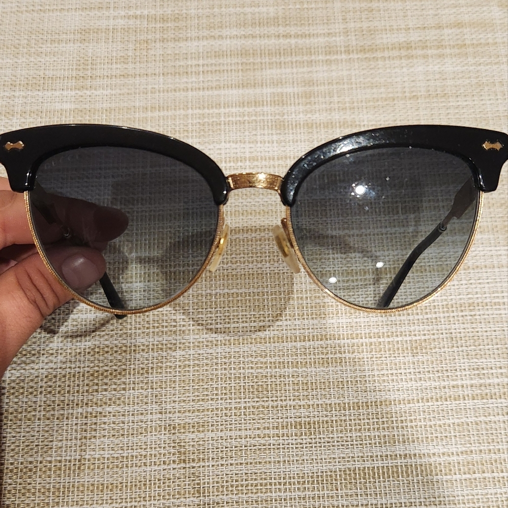Gucci Sunglasses.